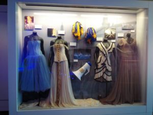 Many memorable props and costumes from Swift's music videos are on display, including the frilly blue dress from the "Our Song," the gown from the "Love Story," and the pompoms from "Shake It Off." Photographer: Isabelle Kantz '16