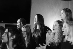 The Upper School Choir sang their hearts out with Ms. Burns at the helm. Photographer: Shishi Shomloo '15