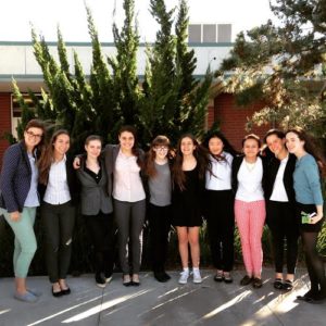 The model UN team poses at their conference. From left to right: Margaret Shirk, Sophie Smyth '17, Noemi Holczer '15, Maddie Hochman '17, Maya Wernick '18, Sophie Evans-Katz '18 , Marine Yamada '17, Zoe Webb-Mack '18, Halle Jacobson '17, Eloise Rollin '17  Photographer: Kathleen Tundermann 