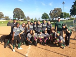 Far left in bottom row, Roberts celebrates with softball team after winning league. She played short-stop freshman year. Used with permission from Marlee Rice.