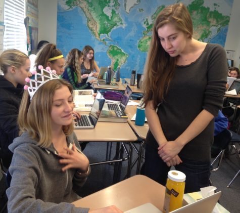 History Teacher, Johanna Greene helps Uma Halsted '18 with a research paper. Greene is in her first year teaching at Archer. 