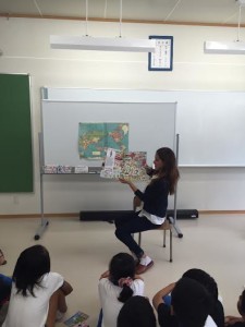 Goldberg reads a book at the Unozumai elementary school which she visits every summer. Goldberg is on Archer's community service board. Photo Courtesy of: Mari Goldberg '17.