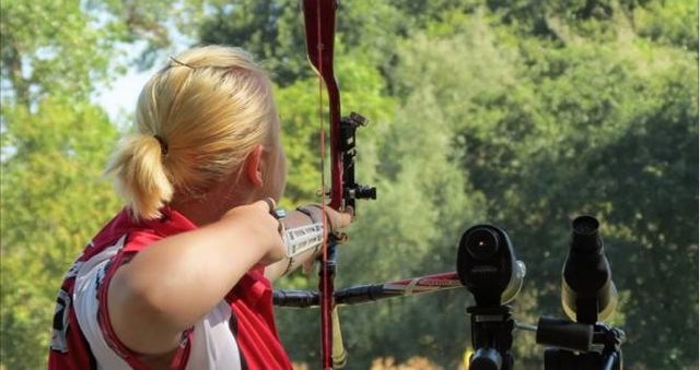 Katie Hershey-Van Horn 14 taking aim. 
