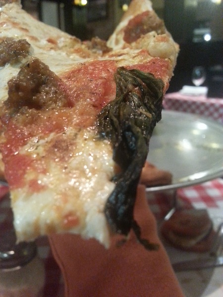 (3)Pizza topped with sausage and garlic. Photographer: Marcela Riddick 16