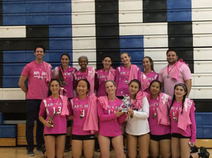 Varisty Volleyball team wins Milken Tournament in October. Their new pink jerseys are worn in recognition of breast cancer awarness month. Photographer: Archer Athletics