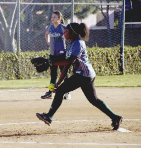 Freshman Kam Bellamy '18 pitched 10 strike outs during Archer softball game against AGBU. Her pitching helped to lead the team to a 16-1 victory, winning by "mercy rule". Photographer: Lindsay Cayton '16