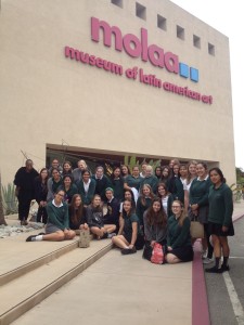 The group poses in front of MOLAA before starting their tour. Photographer: Alyssa Gogesch.