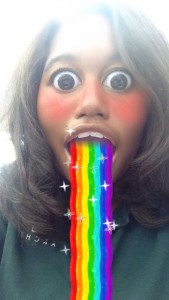 Shelby Mumford using the "Rainbow Lense" on Snapchat.
