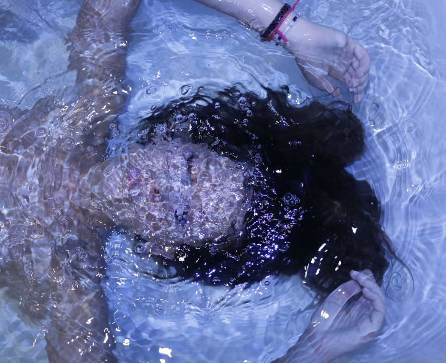 This photo is an untitled work by Rose Shulman-Litwin 18 of student Maya Winkler 18 underwater. Shulman-Litiwn started doing photography a year ago.