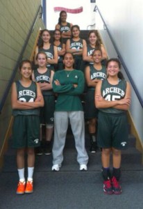 The "Middle School A Team" for basketball, Roberts on the front left. As a seventh grader, she made a team comprised mostly of eighth graders. Used with permission from Marlee Rice.