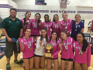 Varsity volleyball team poses with Brentwood Invitational Tournament trophy. Photo courtesy of Sophie Smyth '17.