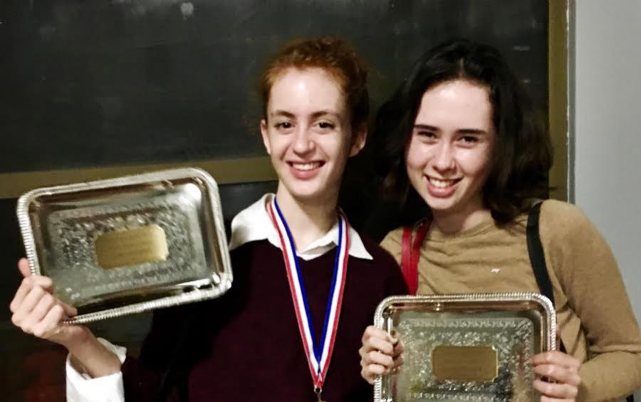 Ciel Torres ‘17 and Isabel Adler ‘17 pose with their awards. Torres won second place as second speaker and the team made it to semi-finals for public forum. Photo by Kate Webster