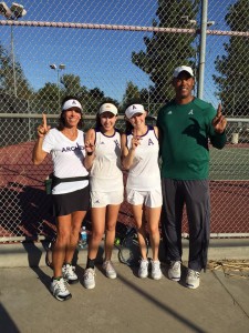 Sara Rabinowitz '17 and Mari Goldberg '17 are pictured with their coaches: Coach Keith and Coach Paula. This photo was taken right after they won league championship. Used with permission from: Marlee Rice 