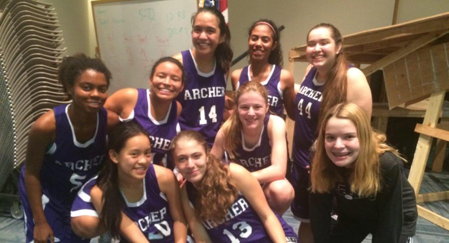 The 2015-2016 Varsity Basketball Team smiles at their game. Photo courtesy of Marcela Riddick 16.