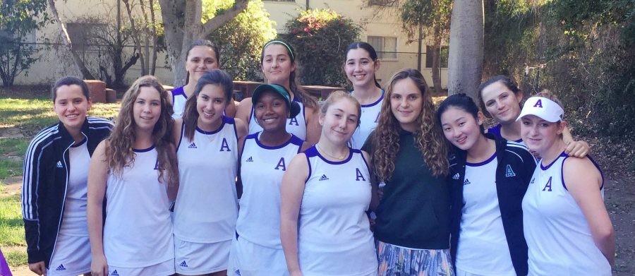 Varsity Tennis pictured smiles together before one of their matches. This season has been an all-time high for the team. Photo courtesy of Sara Rabinowitz 17.