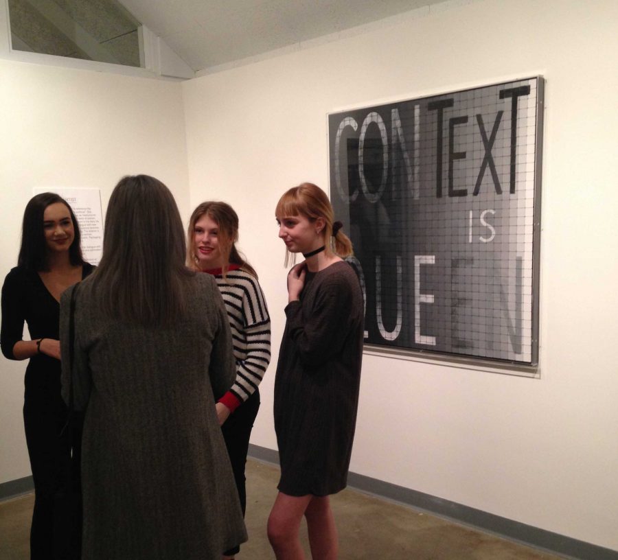 Students from the gallery program speak with Rachel Lachowicz during her shows opening. 