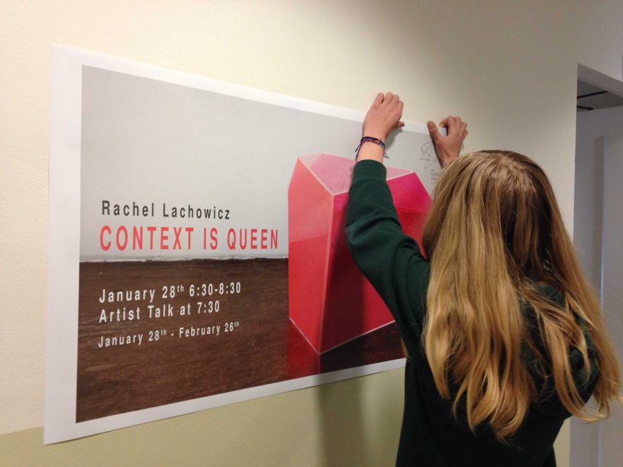 Kisa Rozenbaoum 18 hangs the poster she designed for Rachel Lachowiczs show Context Is Queen. She decided on the design after the gallery programs visit to Shoshana Wayne Gallery on Jan. 12. 