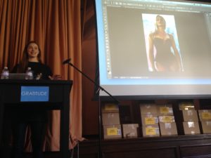 Lawley showed the audience how the body of a fellow model was photoshopped for a swimsuit shoot. Photographer: Cybele Zhang '18.