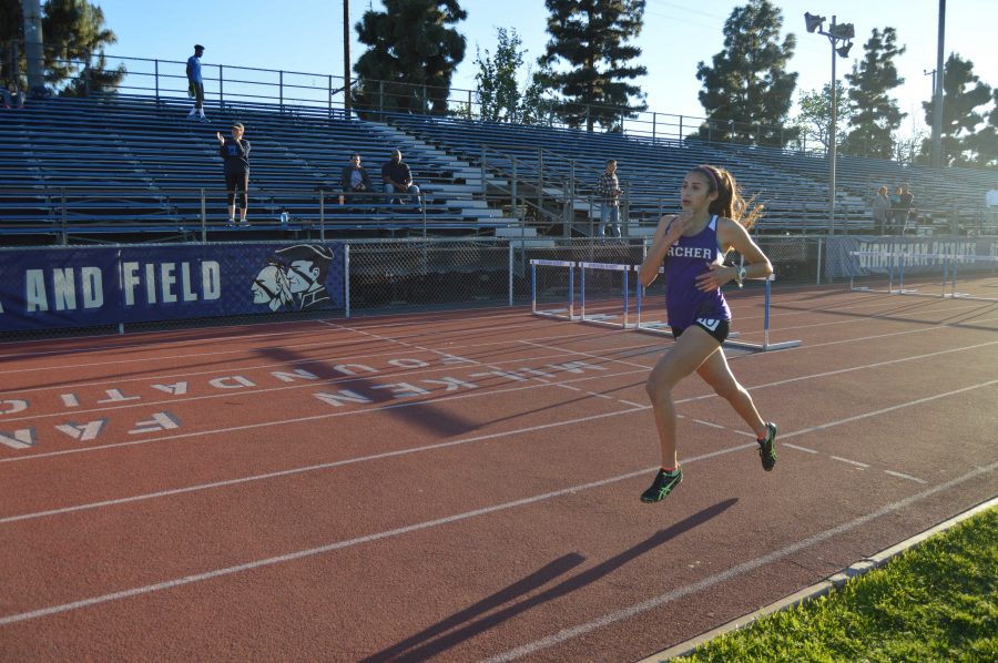 Leyla Namazie 17 runs at a track meet. She recently set a school record in the 800-meter. Photograph courtesy of Amelia Mathis.
