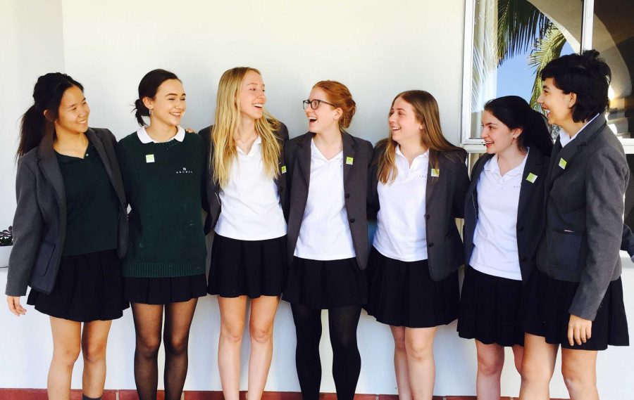 Archer seniors pose for a picture in their formal uniforms designed by Lands End. The company is under fire by both conservatives and liberals after publishing a feature on Gloria Steinem in their catalogue. Photo courtesy of Syd Stone 16.