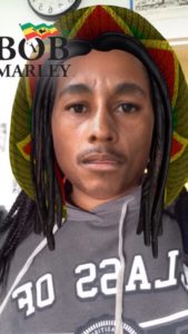 Shelby Mumford '16 uses the Bob Marley Snapchat lens that was released April 20.
