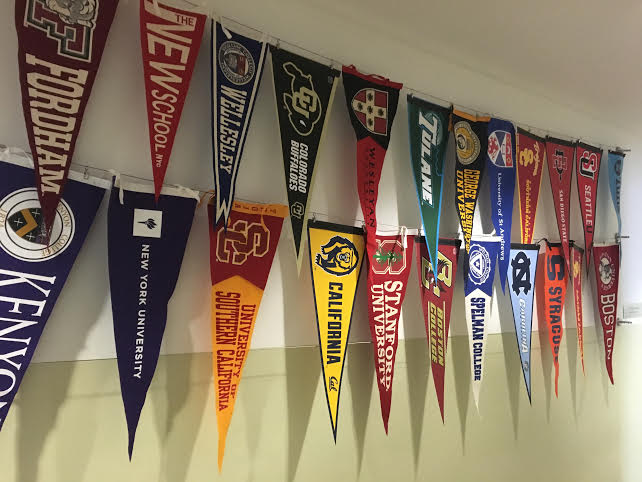 Some of the class of 2016s college pendents hang in the college admissions hallway. The class of 2016 will be attending 29 different schools in 14 states. Photo by Eloise Rollins-Fife 17