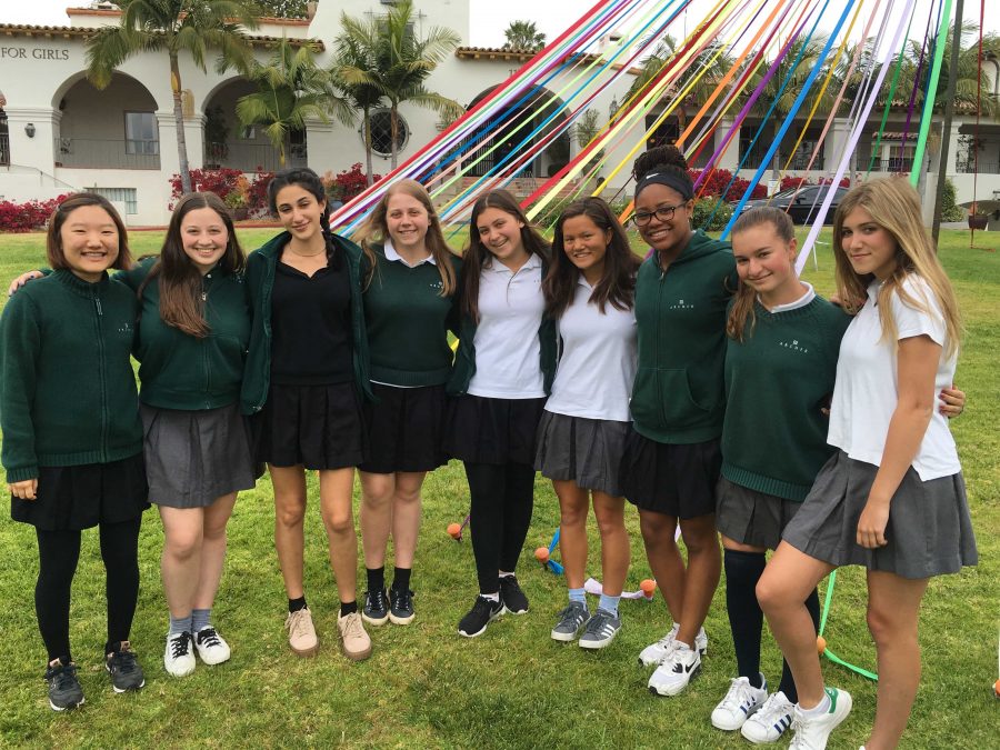 The+2015-2016+Ambassador+Leadership+Team+%28missing+Ari+Brown+16+and+Alyssa+Downer+17%29+pose+in+front+of+the+Maypole.+Their+mission+is+to+create+a+welcoming+environment+for+perspective+Archer+families.+Photographer%3A+