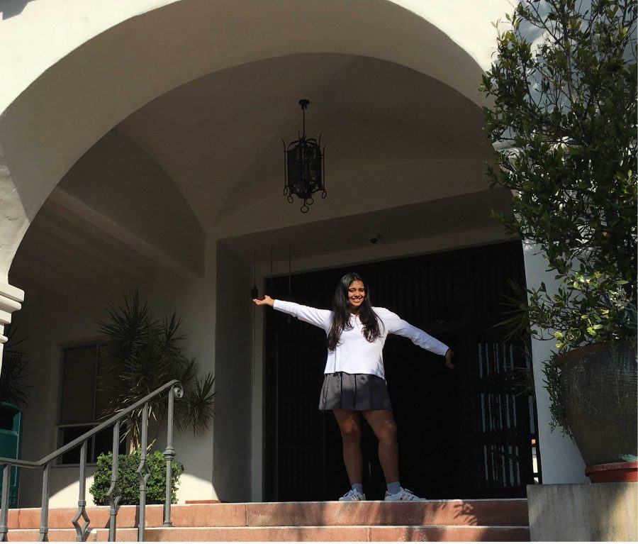 Anika Bhavnani 17 poses in front of The Archer School for Girls. Bhavnani is Editor-In-Chief of The Oracle for the 2016-2017 school year. 