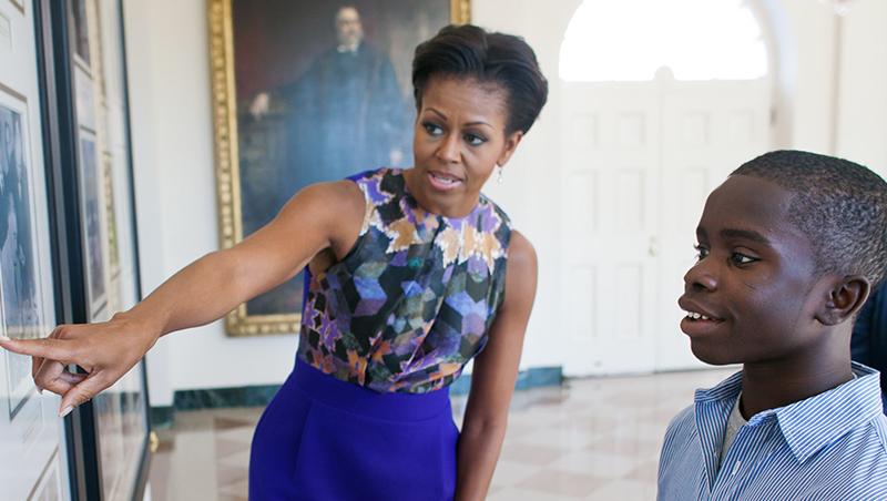 An image of Michelle Obama from the official White House website. The First Ladys friendship with George W. Bush has made headlines after an impromptu hug at the opening of the African American Museum of History and Culture. Image source: The White House.