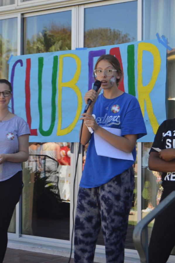 Student Council Executive Board member Maya Winkler 18 addresses students at the 2016 Club Fair. Student Council invites representatives from each club to come onstage and promote themselves. 