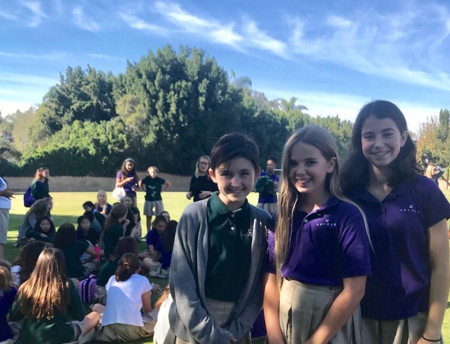 The seventh grade class representatives smile during a class meeting on the back field. I love my grade. Theyre all such amazing people, so I wanted to be one of the people to represent them, Langdon Janos 22 said.
