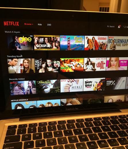 A laptop shows the home screen of Netflix, one of the most popular places to stream TV and movies online. Netflix is the perfect place to binge-watch all of your favorite shows and a common destination for many Archer girls. Explore all of the categories they have to find some new shows, too!
