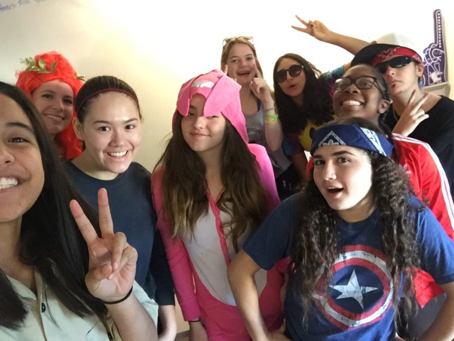Danielle Roberts, Jenn Babin, Cybele Zhang, Meagan Rowles, Gracie Marx, Jael Ellman, Sophie Evans-Katz, Kamryn Bellamy and Macoy Olhbaum pose during advisory on Halloween in 2015. Babin has been Class Dean of 2018 since 2014, but will be taking on the role of Dean of Students in the fall. Image courtesy of Cybele Zhang.
