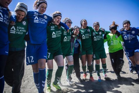 Kim Smith, second from left, celebrates with the entire group of players and coaches after the record setting match. Smith coached Volcano FC in the highest altitude soccer game ever. Image courtesy of Smith.