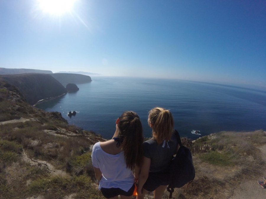 Erica Dick 18 and Locke Luhnow 18 take in the view after a hike on Santa Cruz Island. The seniors spent three days on the Channel Islands for their Fall Outing trip.