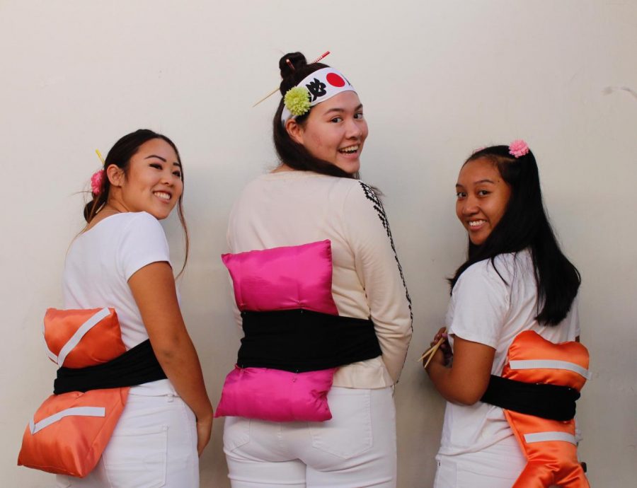 From left to right: Sydney Shintani 18, Cybele Zhang 18 and Cat Oriel 18 dress up as sushi for Halloween. Last year, they won most creative costume in Archers costume contest. 