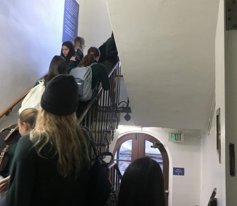 Congestion on the staircase in the East Wing before first period. The traffic has posed inconveniences in terms of getting to class on time, according to students.