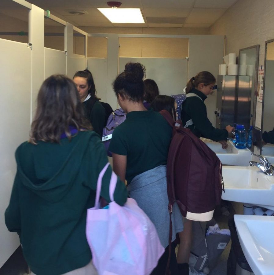 Students wait in line at a new bathrooms in the Classroom Village. There are three restrooms available for students in the village, including an all-gender bathroom.