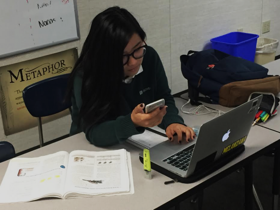 In an empty English classroom during her free period, Ruby Colby ‘19 studies...quietly? The room may be quiet during her free period, but from books to screens, Colby is processing a lot of mental noise.