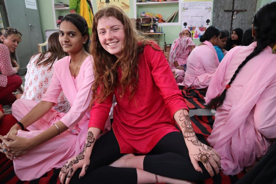 Sophie Larbalestier 20 poses with a new local friend at the Sambhali Trust. Here, the local women gave the Archer students henna tattoos. 