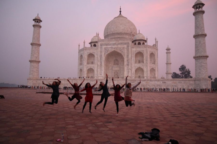 Six Archer students are captured jumping in front of the Taj Mahal at dusk. You can even fathom [how big] the Taj Mahal is, junior Ariana Golpa said. We were all in awe.
