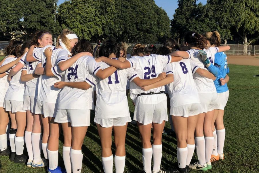 The+Upper+School+varsity+soccer+team+huddles+up+before+todays+game.+The+team+won+3-0+against+Pacifica+Christian+High+School.