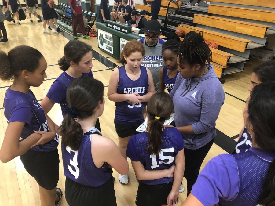 The middle school basketball team at their second game of the season against Calvary Christian. Led by captains Daniella Fenster and Annabelle Turner, the team is made up of sixth, seventh and eighth graders. 