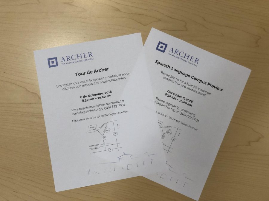 Invitations in Spanish and English for Archers Spanish-Language Campus Preview rest on a table. The event happens every December for families interested in applying for Archer.