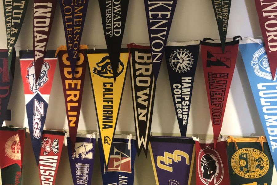 College pennants hang in the hallway. Last Tuesday, top universities including Yale, Stanford and University of Southern California were revealed to be part of a scheme that the FBI dubbed Operation Varsity Blues.