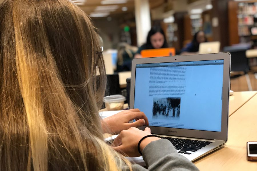 Sophomore Isa Ionazzi does research for a project in history class. A study published in 2017 by the Stanford Graduate School of Education found that 80% of the students tested couldnt identify biased content from mainstream media. 