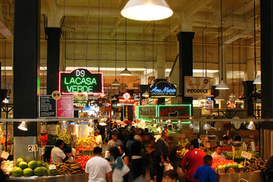 Visitors of Downtown Los Angeles Grand Central Market check out restaurants. The market is home to more than 30 restaurants and different shops.