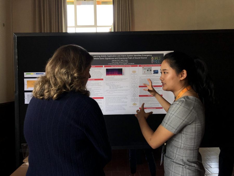 Junior Hannah Kim presents her design for an artificial intelligence mobile application and alarm system that identifies an emergency vehicles siren. Annually, students present their research in the STEM fields at Archers STEM conference. 