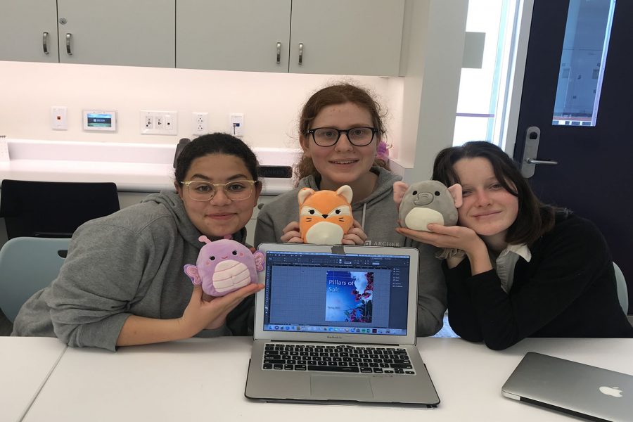 Juliet Youssef 19, Josie Gordon 20 and Madis Kennedy 21 pose with some of the many stuffed animals in the creative writing class. The class biannually contributes to and curates a literary magazine, Pillars of Salt. 
