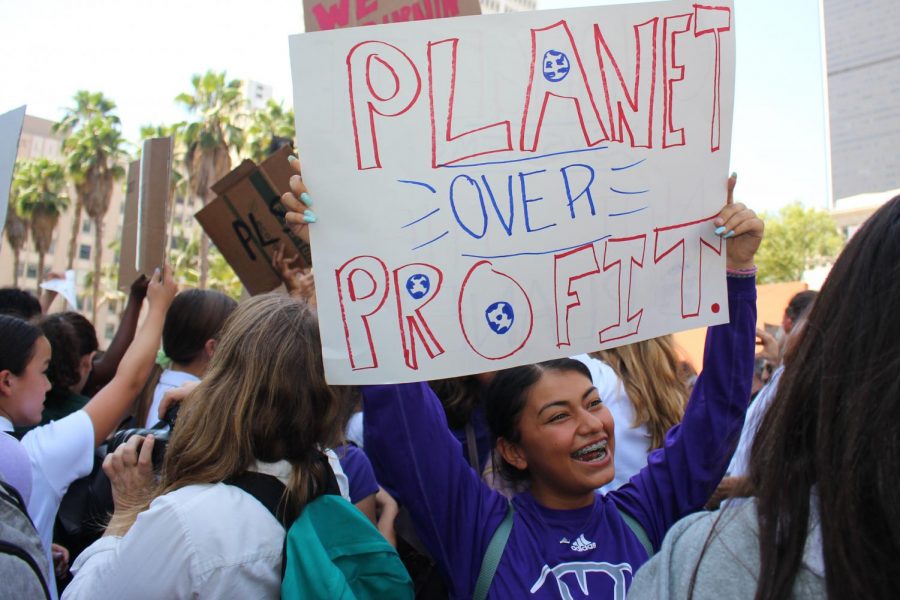 Destiny Morado 22 cheers at the Los Angeles Global Climate Strike. She said she was grateful to attend the event with Archer. It felt so empowering, she said. We had all our sisters together. It showed the world that young people matter. 